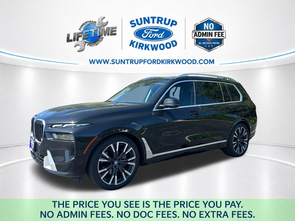 2024 BMW X7 xDrive40i in Black Sapphire Metallic — front three-quarter view