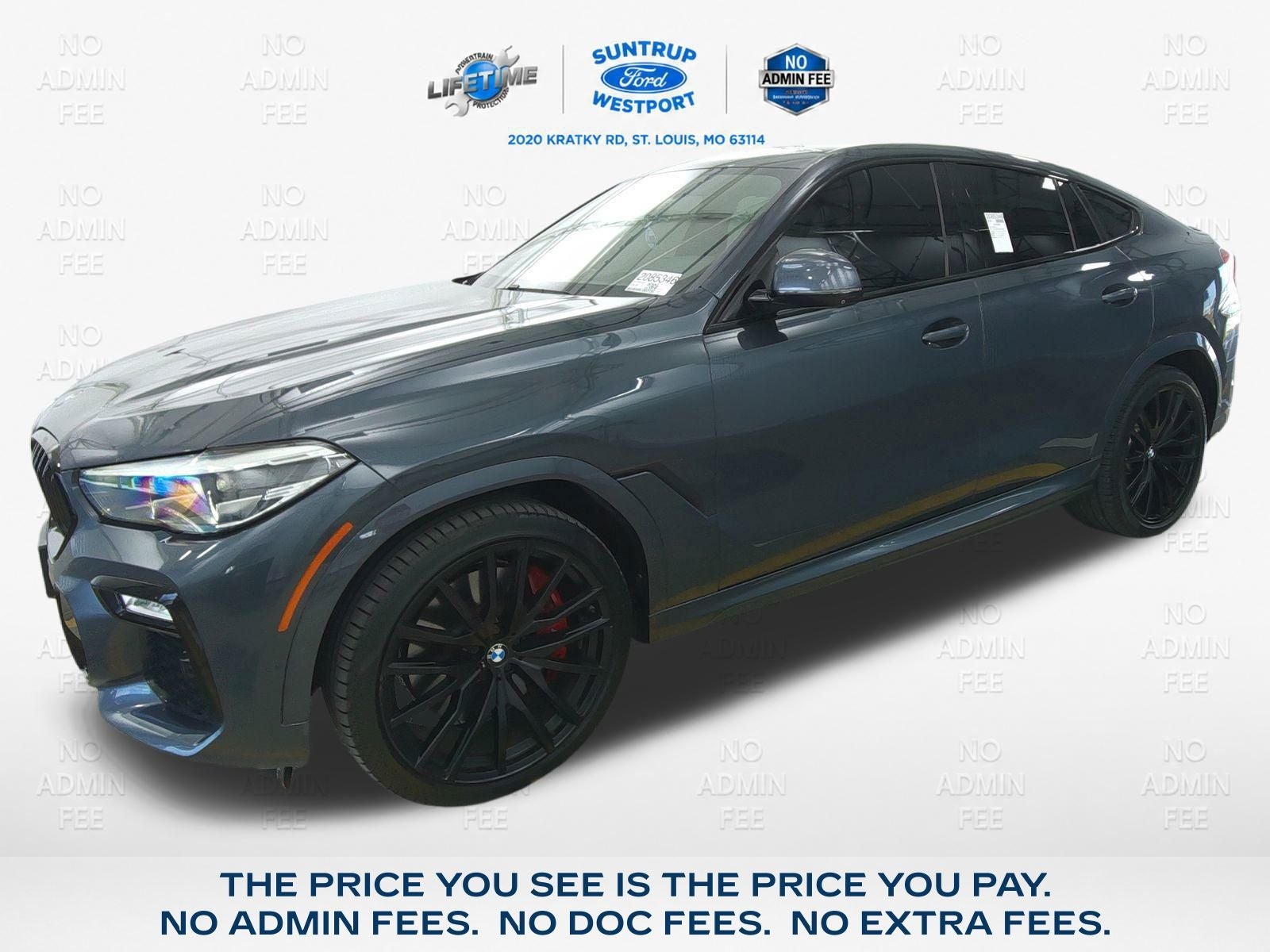 2021 BMW X6 M50i in Arctic Gray Metallic — front three-quarter view